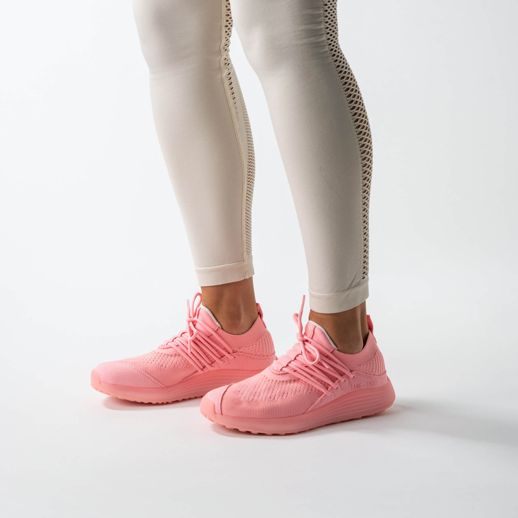LANEEIGHT-TRAINER-AD-1-BubblegumPink-WomensOnFoot