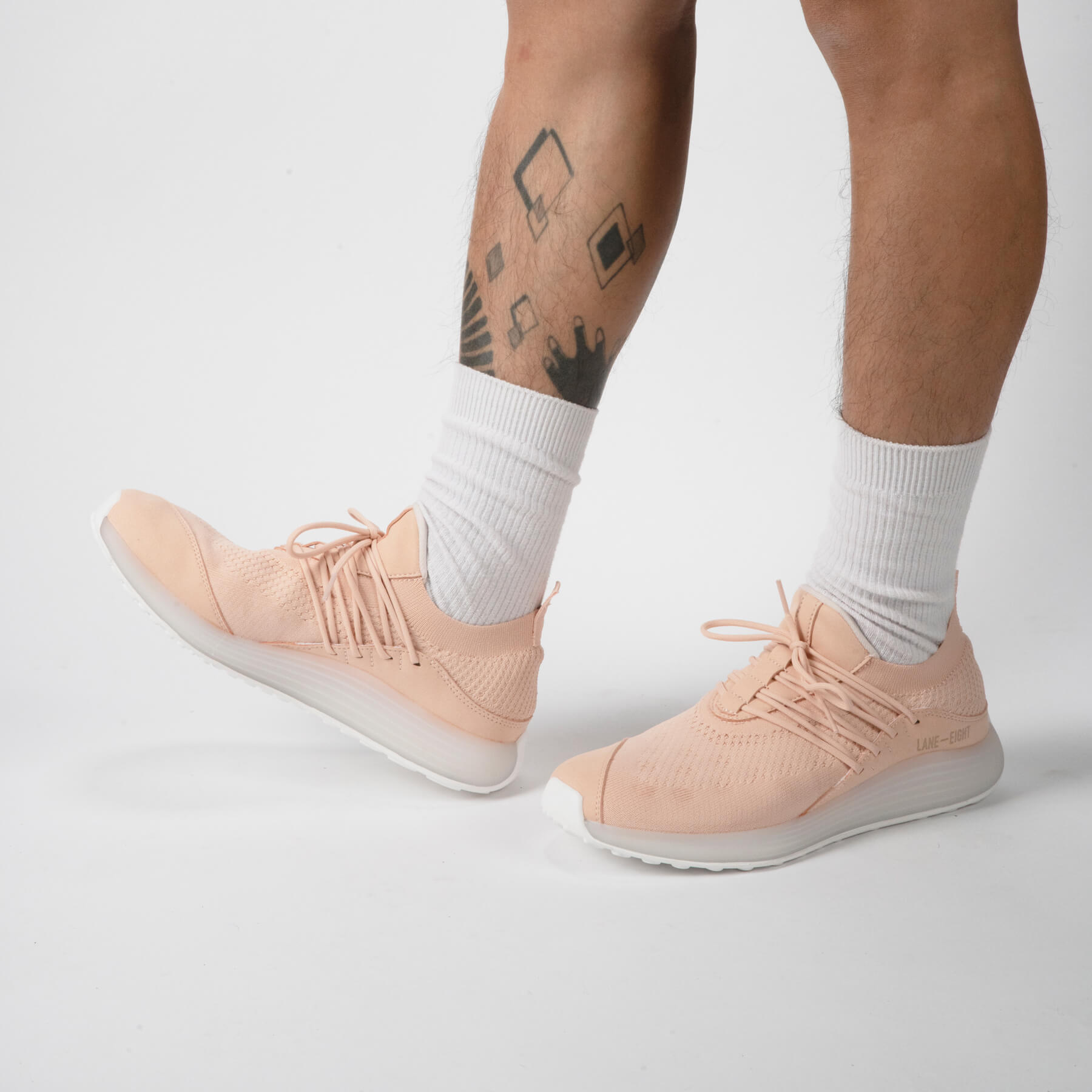 LANEEIGHT-TRAINER-AD-1-PinkSand-MensOnFoot