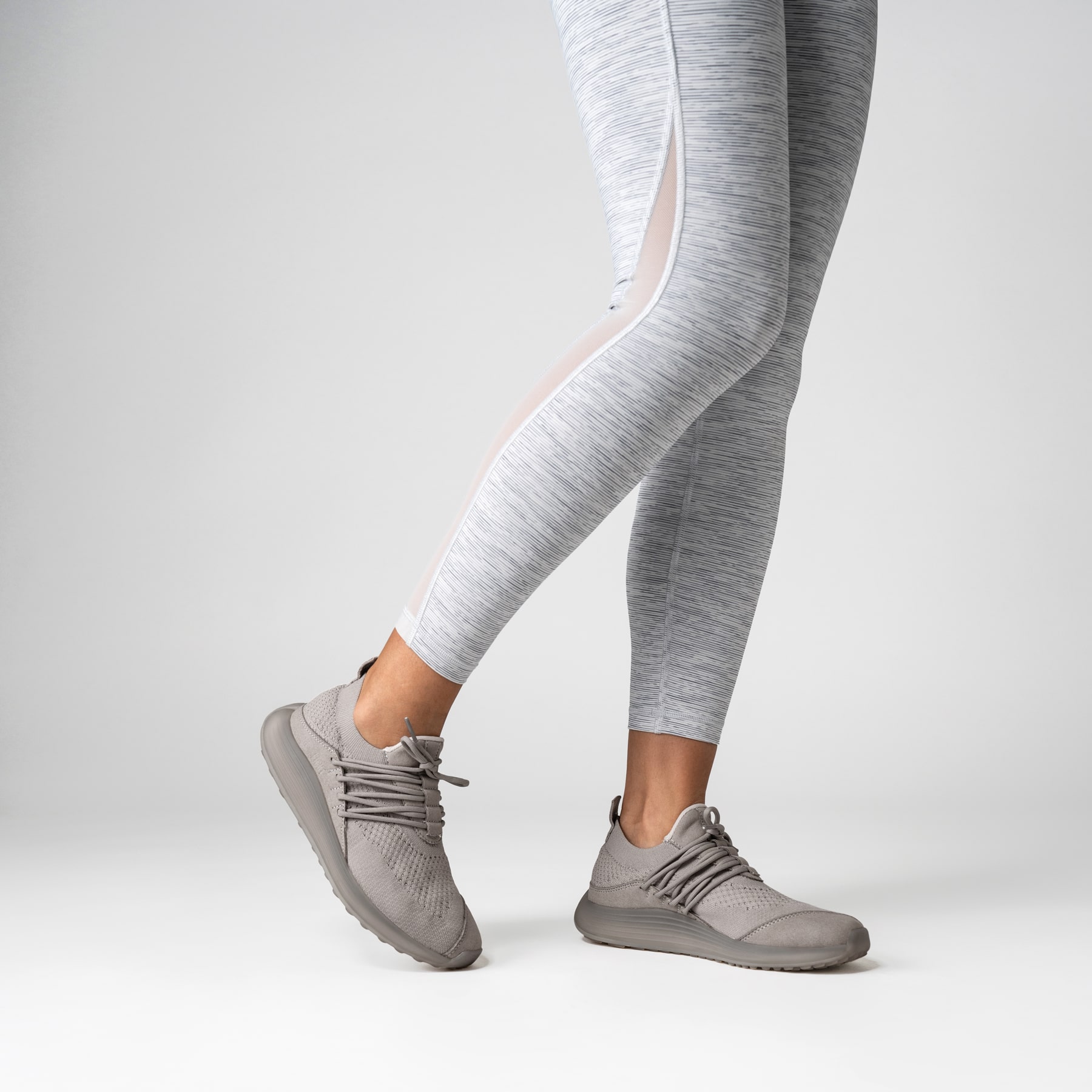 LANEEIGHT-TRAINER-AD-1-LunarGrey-WomensOnFoot-min.jpg