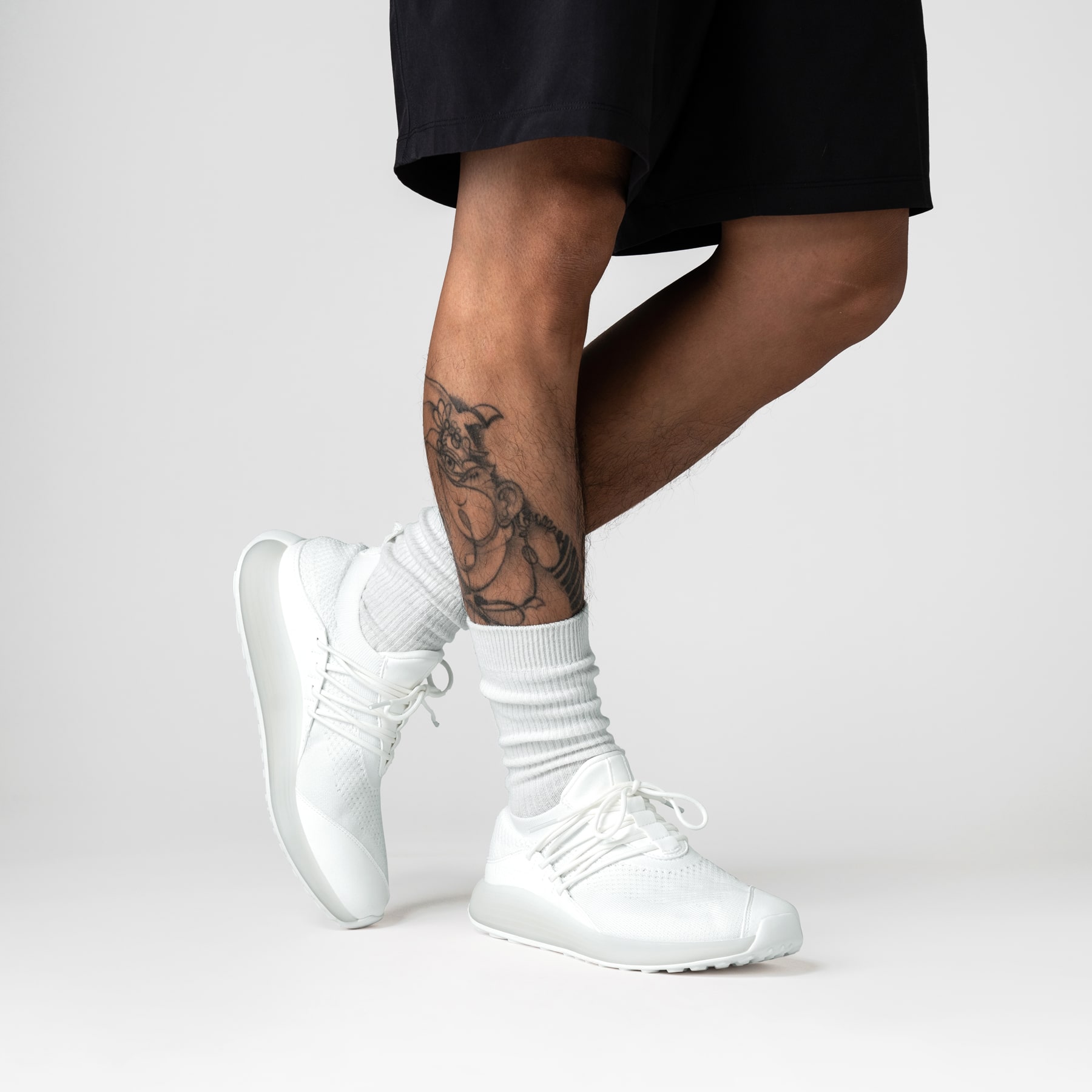 LANEEIGHT-TRAINER-AD-1-CloudWhite-MensOnFoot-min.jpg