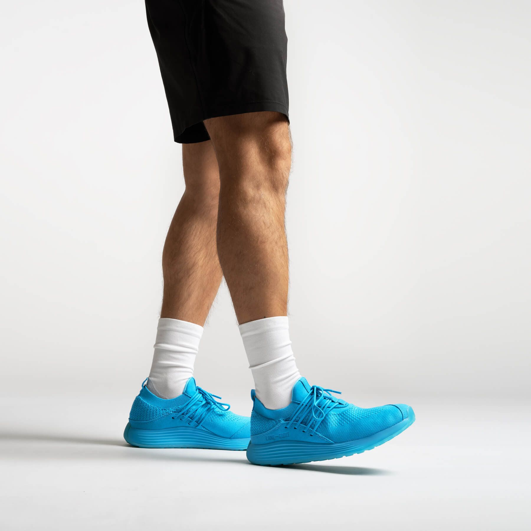 LANEEIGHT-TRAINER-AD-1-ElectricBlue-MensOnFoot.jpg